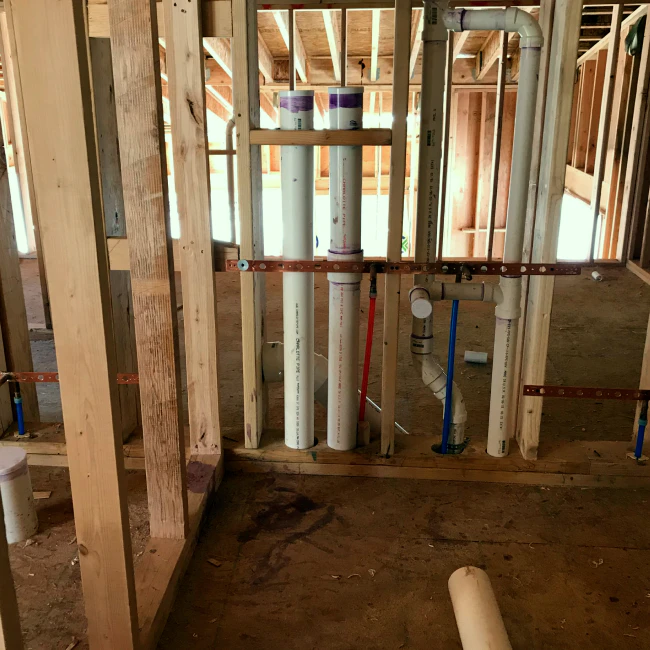 front view of a houses new plumbing delta co